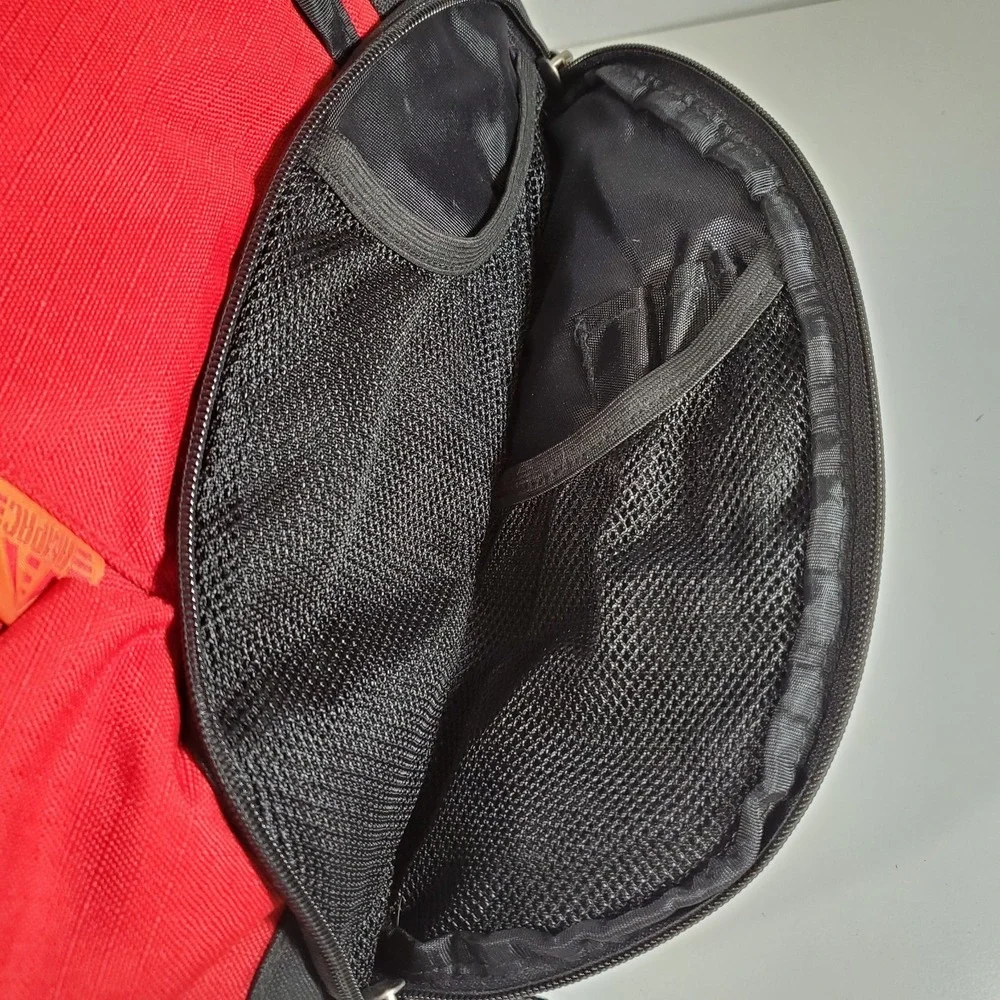 AMPAC Bag Sling Backpack Red Black Shoulder Strap Adjustable Zip Many Pockets